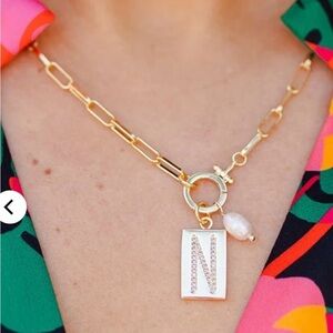 Gold-Toned Necklace with Elongated Chain and Pendant